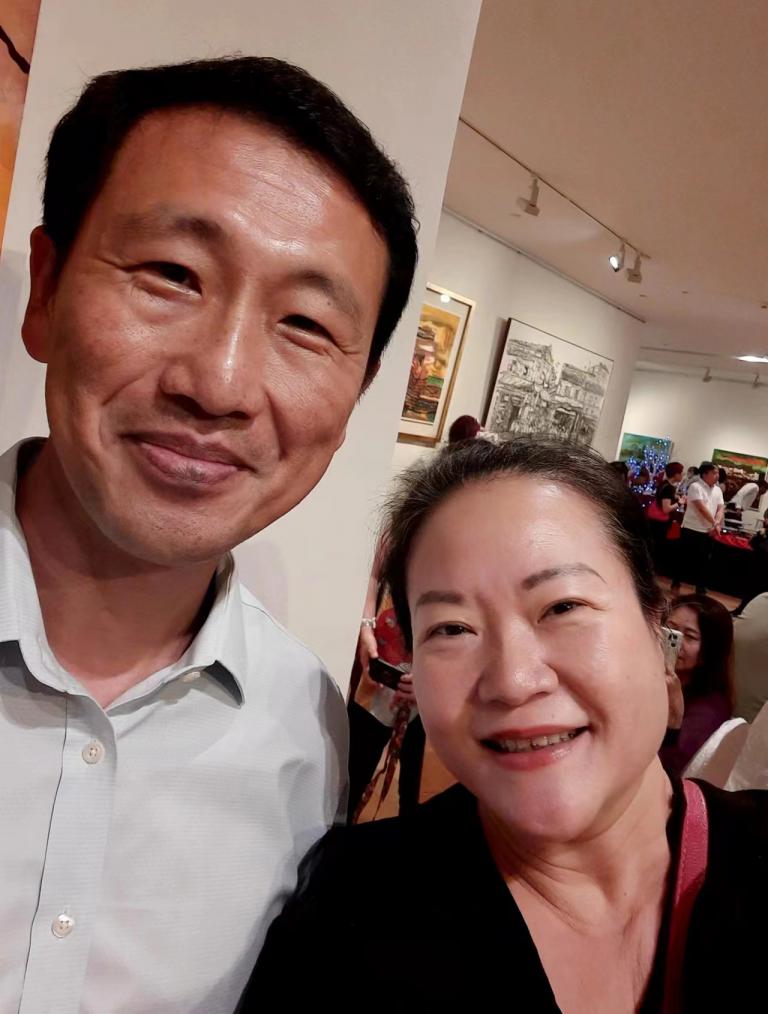 成员与当地前任教育部部长王乙康